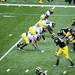 The Michigan teams get set on the line of scrimmage during the spring football game on Saturday, April 13. AnnArbor.com I Daniel Brenner
